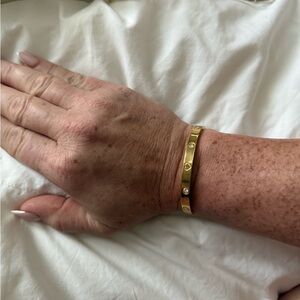 Stylish Gold Bracelet with Gem Accents